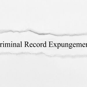 Piece of ripped paper that says criminal record expungement in New Jersey