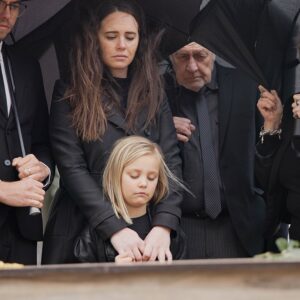 Family at graveside service - wrongful death lawyer Shuttleworth Law, P.C.